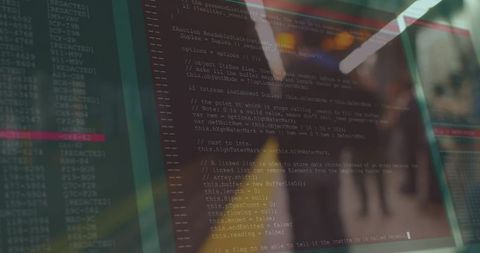 Futuristic transparent screen displaying code in modern office