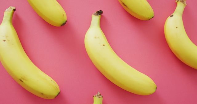Image of fresh bananas on pink background - Download Free Stock Photos Pikwizard.com