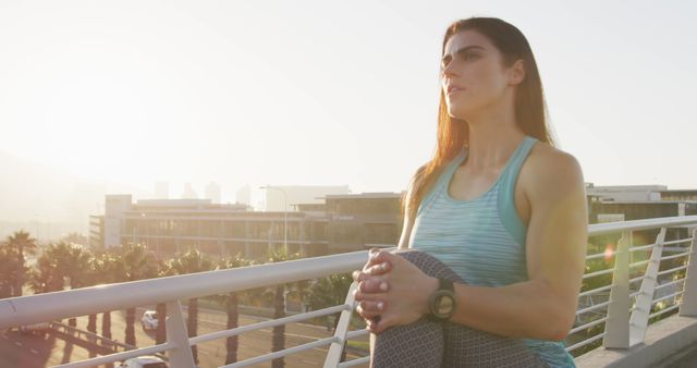 Woman Meditating on City Balcony During Sunrise - Download Free Stock Images Pikwizard.com