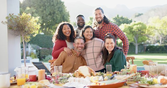 Diverse Friends Enjoying Outdoor Meal in Sunlit Garden - Download Free Stock Images Pikwizard.com