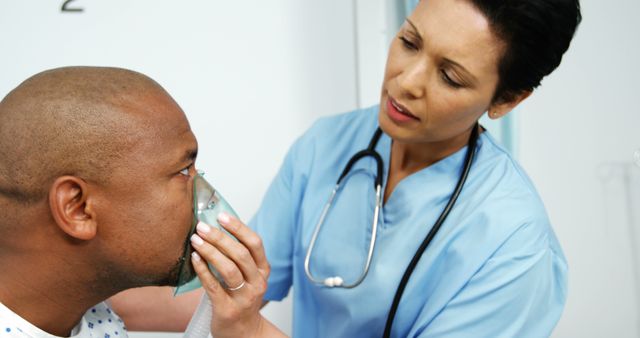 Doctor putting an oxygen mask on the patient at the hospital - Download Free Stock Photos Pikwizard.com