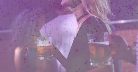 Woman Holding Beer Mug Conversing in a Bar Scene