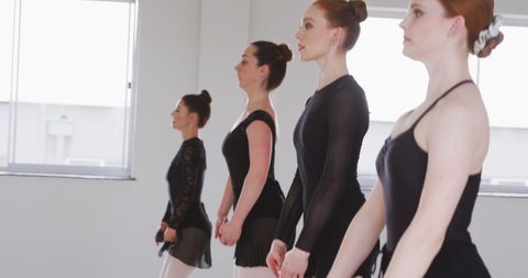 Focused Ballet Dancers Concentrating at Dance Studio - Download Free Stock Images Pikwizard.com