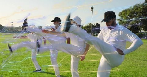 Cricketers kicking in unison with futuristic neon circuit overlay for team training