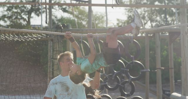 Father Supporting Daughter Obstacle Course Adventure - Download Free Stock Images Pikwizard.com