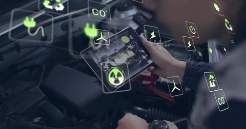 Mechanic Analyzing Engine Diagnostics with Technology Interface