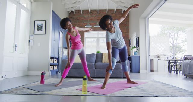 Mother and Daughter Exercising Together at Home - Download Free Stock Images Pikwizard.com