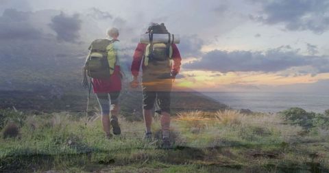 Couple Hiking at Sunset on Scenic Coastal Trail