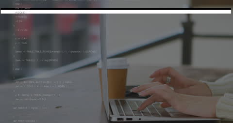 Hands Typing on Laptop with Digital Data Overlay