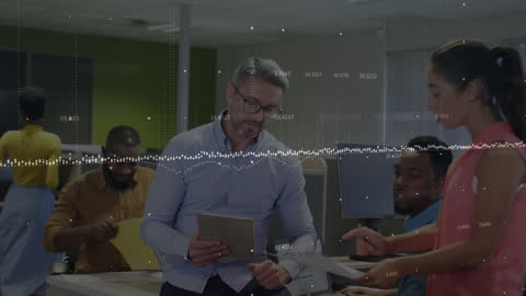 Diverse Business Team Collaborating with Financial Data Overlay