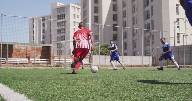 Competitive soccer match in urban outdoor setting - Download Free Stock Images Pikwizard.com