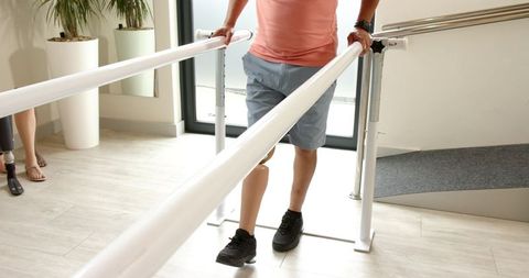 Senior Patient Using Prosthetic Leg in Rehabilitation