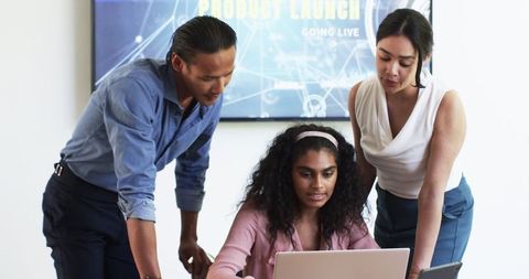 Diverse Team Collaborating on Successful Project