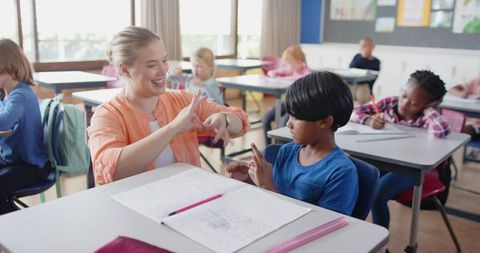 Diverse classroom interaction with teacher using sign language