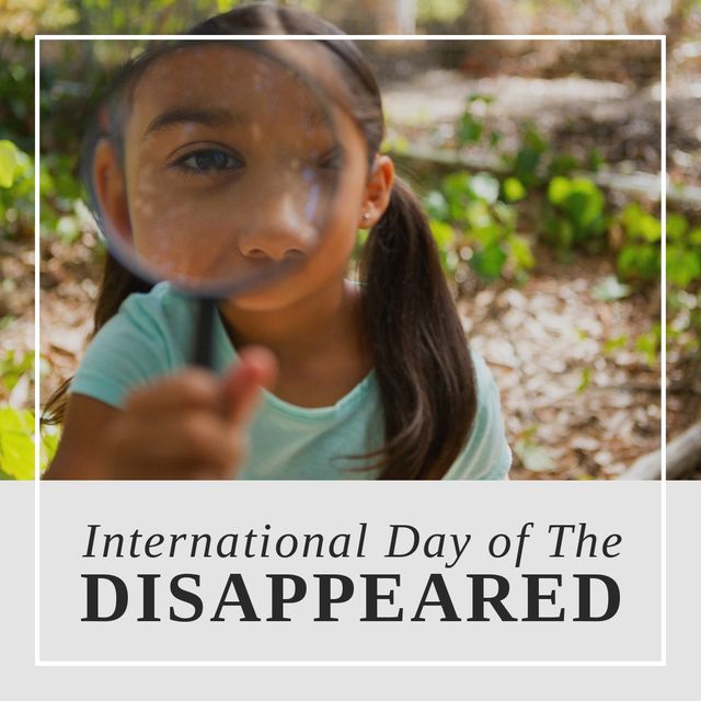 Composite of biracial girl holding magnifying glass and international day of the disappeared text. Childhood, searching, portrait, copy space, imprison, missing, kidnapped, awareness and alertness.