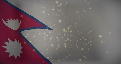 Nepal flag waving at left with golden bokeh on gray backdrop for patriotic celebration