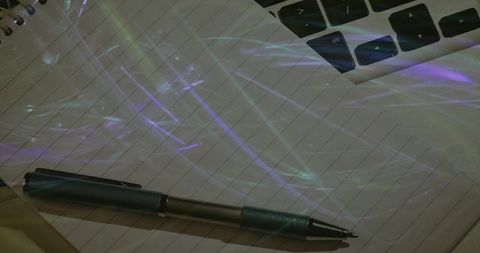 Modern Workspace with Notebook, Pen and Laptop