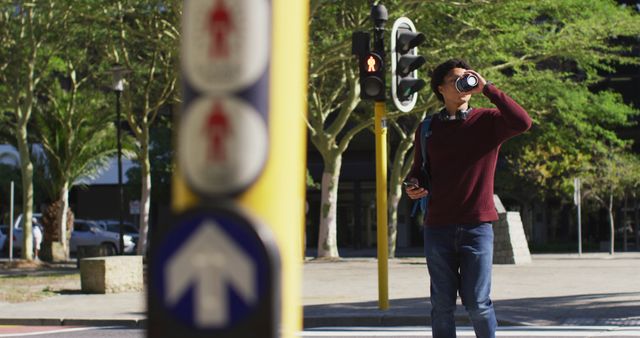 Man Drinking Coffee at Urban Crosswalk in Sunlit Street - Download Free Stock Images Pikwizard.com