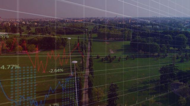 This video shows an urban park landscape with overlaid financial data graphics. It can be used in contexts discussing the relationship between ecology and finance, sustainability in urban planning, or digital tools for environmental monitoring.