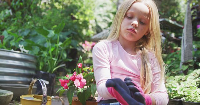 Young Girl Preparing to Garden in Outdoor Setting - Download Free Stock Images Pikwizard.com