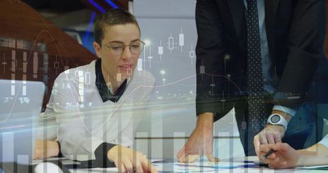 Team Analyzing Financial Data in Modern Corporate Office