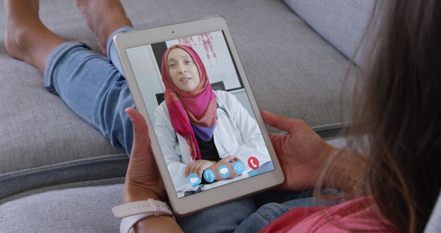 Woman Using Tablet for Online Consultation with Female Doctor - Download Free Stock Images Pikwizard.com