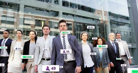 Diverse business team walking with digital analytics concept