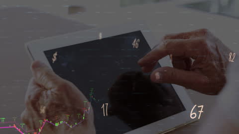 Hands Using Tablet with Financial Data Overlay