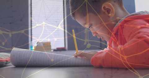 Young Student Writing with Networking Overlay Representing Innovation