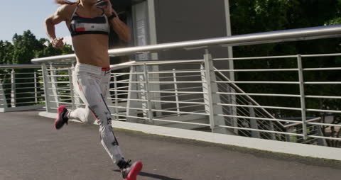 Caucasian Athlete Running in Urban Setting on Sunny Day