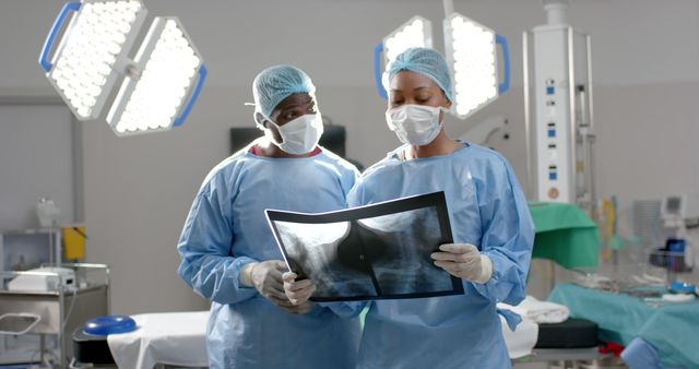 Doctors Examining X-Ray in Surgical Suite - Download Free Stock Images Pikwizard.com