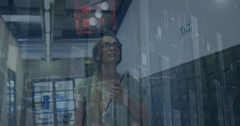Caucasian Businesswoman Defocused with Financial Data Overlay