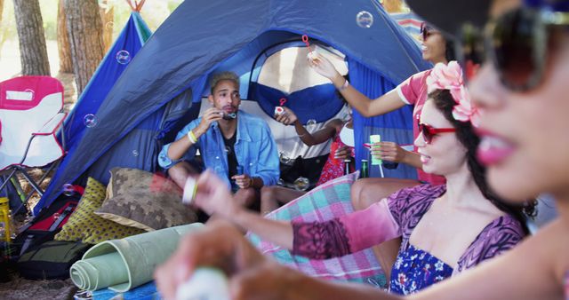 Group of Friends Blowing Bubbles at Camping Trip - Download Free Stock Images Pikwizard.com