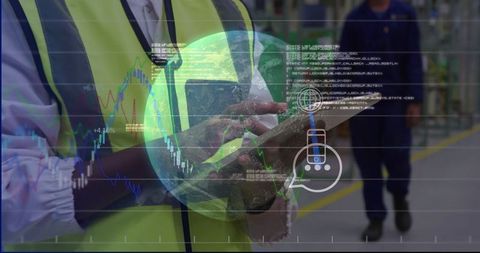Worker Using Tablet with Digital Overlay in Manufacturing Plant