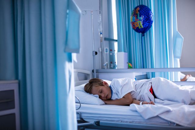 Child Patient Sleeping in Hospital Bed with Get Well Soon Balloon - Download Free Stock Photos Pikwizard.com