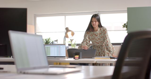 Young Woman Working in Modern Office Standing Desk - Download Free Stock Images Pikwizard.com