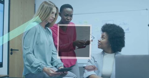 Diverse Business Team Discussing Data in Modern Office