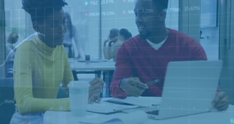 Collaborative Office Meeting with Financial Data Overlay