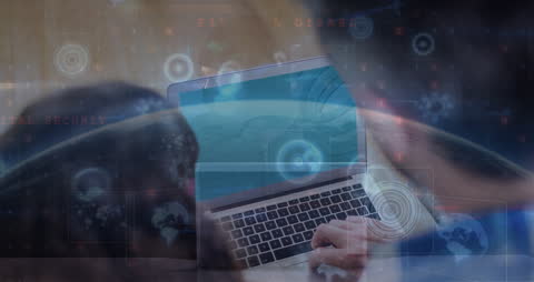 Couple Using Laptop With Data Processing Overlay