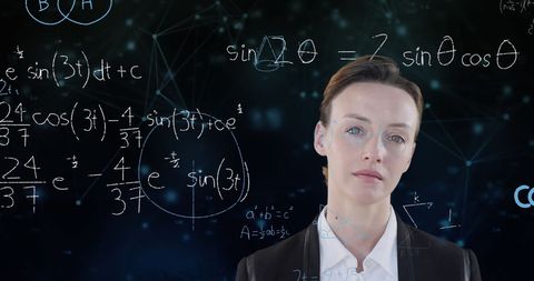 Businessperson Analyzing Mathematical Calculations and Graphs - Download Free Stock Images Pikwizard.com