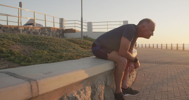 Senior Man Resting After Morning Run by Seaside - Download Free Stock Images Pikwizard.com