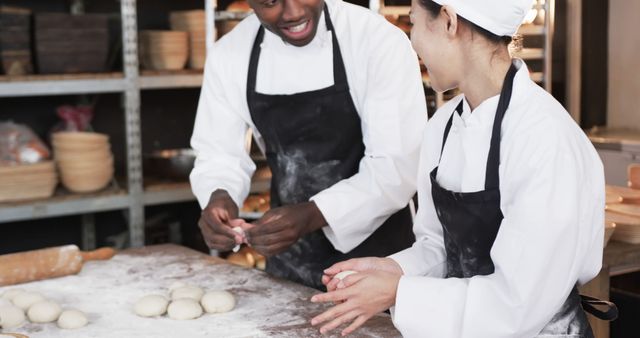 Two Bakers Preparing Dough in Commercial Kitchen - Download Free Stock Images Pikwizard.com