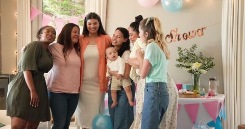 Diverse Female Friends Enjoying Baby Shower Celebration