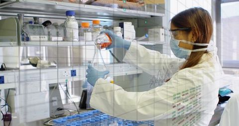Female Scientist Analyzing Chemical in Modern Laboratory - Download Free Stock Images Pikwizard.com