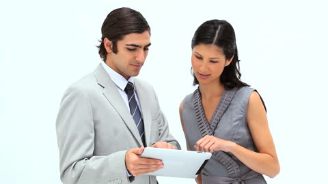 Professionals Collaborating with Tablet Technology