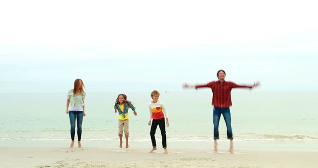 Happy Family Jumping on Beach - Download Free Stock Images Pikwizard.com