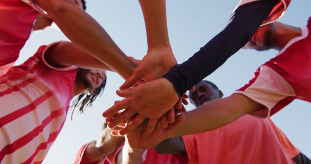 Multiracial Soccer Team in a Group Huddle on Field - Download Free Stock Images Pikwizard.com