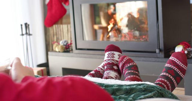 Cozy Winter Evening Relaxing by Fireplace with Wool Socks - Download Free Stock Images Pikwizard.com