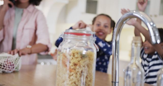 Mother Preparing Groceries with Kids in Kitchen - Download Free Stock Images Pikwizard.com