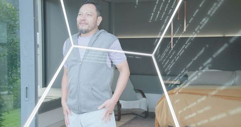 Standing man wearing gray vest and sweatpants by glass door with holographic code overlay